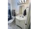 Cozy bathroom with white vanity, bright lighting, and decorative grey towels at 4765 W Mediterranean Dr, Glendale, AZ 85301