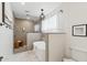 Modern bathroom with separate tub and shower, sleek fixtures, and tile accents at 5232 E Everett Dr, Scottsdale, AZ 85254