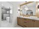 Elegant bathroom featuring double sink vanity, stone countertops, and modern fixtures at 5232 E Everett Dr, Scottsdale, AZ 85254