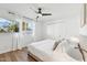 Stylish bedroom with natural light, sleek ceiling fan, and closet at 5232 E Everett Dr, Scottsdale, AZ 85254