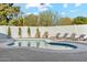 Enjoy this pool with a seating area, lush greenery, and ample space for relaxation and entertainment at 5232 E Everett Dr, Scottsdale, AZ 85254