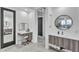 Stunning primary bathroom featuring dual vanities, a makeup vanity, and modern fixtures at 5636 E Libby St, Scottsdale, AZ 85254