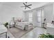 Bright and airy bedroom featuring neutral tones, plush rug, and natural lighting at 5636 E Libby St, Scottsdale, AZ 85254