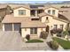 Aerial view of a stunning two-story home showcasing a tile roof and a well-manicured front yard at 5636 E Libby St, Scottsdale, AZ 85254