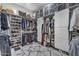 Spacious walk-in closet with ample storage for clothes, shoes, and accessories at 5636 E Libby St, Scottsdale, AZ 85254