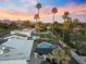 Aerial view showcasing a backyard pool, putting green and desert landscaping at 6601 E Hearn Rd, Scottsdale, AZ 85254