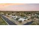 Aerial view showcasing a home with a pool, sports court, and beautifully landscaped backyard at 6601 E Hearn Rd, Scottsdale, AZ 85254