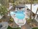 Aerial view of a backyard pool area complete with a covered patio and desert landscaping surrounding the property at 6601 E Hearn Rd, Scottsdale, AZ 85254