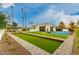 Expansive backyard with a bocce ball court, putting green, and a basketball court at 6601 E Hearn Rd, Scottsdale, AZ 85254