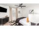 Bedroom with a sleek dresser, neutral walls, and decorative accents at 6601 E Hearn Rd, Scottsdale, AZ 85254