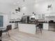 Spacious kitchen featuring an island, stainless steel appliances, and modern white cabinets at 6601 E Hearn Rd, Scottsdale, AZ 85254