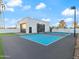 An outdoor sports court features a basketball hoop and tennis court at 6601 E Hearn Rd, Scottsdale, AZ 85254