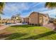 Expansive backyard with a pristine pool and an inviting outdoor seating area for relaxing and entertaining guests at 662 W Raven Dr, Chandler, AZ 85286