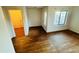 Bright living room featuring wood-look flooring and a large window at 6727 E Stacy St, Florence, AZ 85132