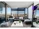 Modern living room featuring floor-to-ceiling windows with picturesque views and stylish furnishings at 7180 E Kierland Blvd # 508, Scottsdale, AZ 85254