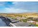 Rooftop deck featuring lounge chairs offer panoramic city and mountain views at 7180 E Kierland Blvd # 508, Scottsdale, AZ 85254