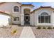 Front entrance featuring beautiful desert landscaping and updated walkway at 951 N Poinciana Rd, Gilbert, AZ 85234