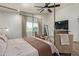 Relaxing main bedroom featuring natural light, neutral tones, and a seating area at 951 N Poinciana Rd, Gilbert, AZ 85234