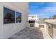 Modern outdoor kitchen with built in grill and concrete counter tops at 951 N Poinciana Rd, Gilbert, AZ 85234