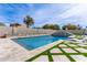 Stunning backyard oasis with in-ground pool, spa, and sun loungers at 951 N Poinciana Rd, Gilbert, AZ 85234