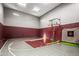 Indoor basketball court with high ceilings, painted brick walls, and proper basketball equipment at 10029 E Calle De Las Brisas --, Scottsdale, AZ 85255
