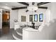 Elegant dining room featuring a unique sunken design, statement lighting, and seating for eight at 10029 E Calle De Las Brisas --, Scottsdale, AZ 85255