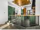 Modern kitchen featuring two-tone cabinets, bar seating, and staircase access to additional living space at 10029 E Calle De Las Brisas --, Scottsdale, AZ 85255