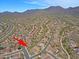 An aerial view of a Primary-planned community in a desert landscape at 10250 E Morning Star Dr, Scottsdale, AZ 85255