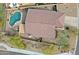 Aerial view of a home with a private backyard pool and patio at 10250 E Morning Star Dr, Scottsdale, AZ 85255