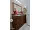 Bathroom featuring vanity with granite counters, single sink, and wood cabinets at 10250 E Morning Star Dr, Scottsdale, AZ 85255