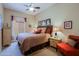 Bedroom featuring a ceiling fan, window and carpet flooring and an upholstered bed at 10250 E Morning Star Dr, Scottsdale, AZ 85255