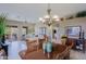 Open floor plan: dining area flows to living room and has a view of the backyard at 10250 E Morning Star Dr, Scottsdale, AZ 85255
