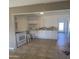 Bright kitchen featuring white cabinets and tile flooring at 1144 E Sunnyslope Ln, Phoenix, AZ 85020