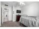 Inviting bedroom with carpet, ceiling fan, and ample space for rest and relaxation at 11851 W Alvarado Rd, Avondale, AZ 85392