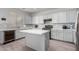 Bright kitchen with white countertops, stainless steel appliances, and an island at 11851 W Alvarado Rd, Avondale, AZ 85392