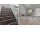 Bright open living space with staircase leading up to the second floor at 11851 W Alvarado Rd, Avondale, AZ 85392