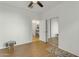 Spacious bedroom with hardwood floors, an ensuite bathroom, and a walk-in closet at 12050 N Panorama Dr # 107, Fountain Hills, AZ 85268