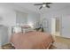 Comfortable bedroom featuring modern decor, soft lighting, and a view into the ensuite bathroom at 12050 N Panorama Dr # 107, Fountain Hills, AZ 85268