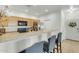 Contemporary kitchen with a breakfast bar, stainless steel appliances, and ample cabinet space at 12050 N Panorama Dr # 107, Fountain Hills, AZ 85268