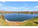 Beautiful view of the community lake, surrounded by the lush golf course and stunning homes at 12050 N Panorama Dr # 107, Fountain Hills, AZ 85268