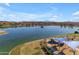 Aerial view showcasing the tranquil community lake with a playground and picnic area, offering a scenic retreat at 12050 N Panorama Dr # 107, Fountain Hills, AZ 85268