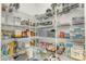 Walk-in pantry with wire shelving provides tons of organized storage for food and kitchen essentials at 12050 N Panorama Dr # 107, Fountain Hills, AZ 85268