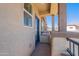 Cozy covered balcony with a metal railing, providing a relaxing space to enjoy the outdoors at 1255 N Arizona Ave # 1246, Chandler, AZ 85225