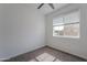 A clean and simple bedroom with neutral carpet and a large window at 1255 N Arizona Ave # 1246, Chandler, AZ 85225