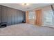 Bedroom offers plush carpeting, a statement wall and a window for lots of light at 1255 N Arizona Ave # 1246, Chandler, AZ 85225