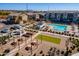 Gathering area with pool, BBQ, picnic tables and green space for resident enjoyment at 1255 N Arizona Ave # 1246, Chandler, AZ 85225