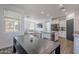 Open dining area featuring a dark wood table with bench seating and modern decor at 1255 N Arizona Ave # 1246, Chandler, AZ 85225