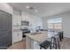 Bright and airy kitchen showcasing granite counters, modern stainless appliances, and a central island at 1255 N Arizona Ave # 1246, Chandler, AZ 85225