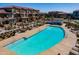 Community pool with lounge chairs and ample space for community members to enjoy a swim at 1255 N Arizona Ave # 1246, Chandler, AZ 85225