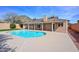 Inviting backyard pool with a mountain view, patio, and privacy wall surrounding the house at 13014 N 23Rd Pl, Phoenix, AZ 85022